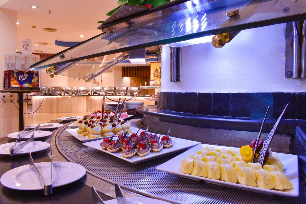 Parrotel Beach Resort Sharm el-Sheikh Exterior photo A buffet at a hotel